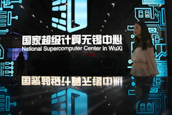 A woman walks in the hallway of the National Supercomputer Center in Wuxi, which hosts the Shenwei (Sunway) TaihuLight supercomputer.