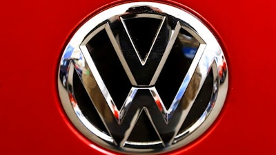 This Feb. 14, 2019, file photo, shows the Volkswagen logo on an automobile at the 2019 Pittsburgh International Auto Show in Pittsburgh. The U.S. government’s road safety agency has opened two investigations into problems with Volkswagen vehicles, including one that alleges serious gasoline leaks under the hood. Details of the probes covering nearly 215,000 vehicles were posted Friday, April 2, 2021, on the National Highway Traffic Safety Administration website.