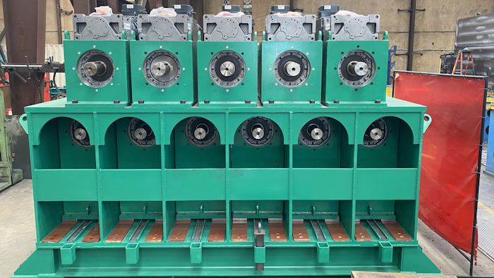 This photo shows the business end of the roller leveler’s drive unit—when installed, a drive shaft will be attached to the end of each gearbox.