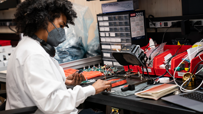 In this Wednesday, April 28, 2021 file photo, an employee manually assembles a circuit-board element before a ribbon-cutting ceremony to mark the opening of a Nanotronics manufacturing center at the Brooklyn Navy Yard in the Brooklyn borough of New York. Growth in U.S. manufacturing slowed slightly in April, reflecting in part supply-chain troubles, after hitting a 37-year high in March.