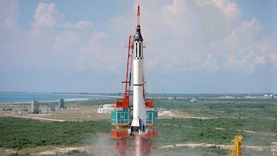 Astronaut Alan Shepard is launched into space atop a Mercury-Redstone rocket from Cape Canaveral, Fla., May 5, 1961.