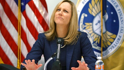 Consumer Financial Protection Bureau Director Kathy Kraninger speaks to media at the CFPB offices in Washington, Dec. 11, 2018.