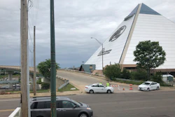 Transportation officers and police block an Interstate 40 onramp to the bridge over the Mississippi River near downtown Memphis, Tenn., on Tuesday, May 11, 2021. The Arkansas Department of Transportation tweeted on Tuesday that it found a crack during a routine inspection of the bridge.