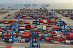 In this April 8, 2021 file photo, a container port on the Yangtze River is seen in an aerial view in Nantong in eastern China's Jiangsu province.