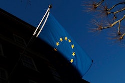 In this file photo dated Friday Jan. 22, 2021, the European Union flag flies outside Europe House in London. Privacy campaign groups Thursday May 27, 2021, have filed a slew of legal complaints with European regulators against Clearview AI, alleging the facial recognition technology it provides to law enforcement agencies and businesses has stockpiled biometric data on more than 3 billion people without their knowledge or permission by “scraping' images from websites, breaching stringent EU privacy rules.