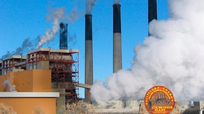 In this Nov. 29, 2006 file photo, steam rises from the huge boiler units at the Jim Bridger Power Plant, east of Rock Springs, Wyo. A law signed April 6, 2021, by Republican Gov. Mark Gordon creates a $1.2 million fund for an initiative that marks the latest attempt by state leaders to help coal in the state that accounts for the bulk of U.S. coal production, which is down by half since 2008. Wyoming coal production, which accounts for about 40% of the nation's total, has declined as utilities switch to gas, which is cheaper to burn to generate electricity.