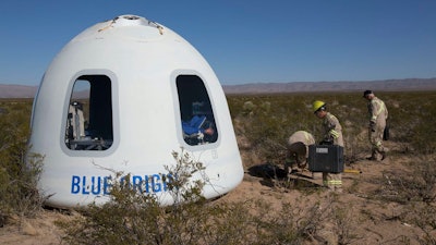 The first tourist to fly on a privately owned spaceship will ride in Blue Origin’s New Shepard Crew Capsule, seen here after a test flight in Texas.
