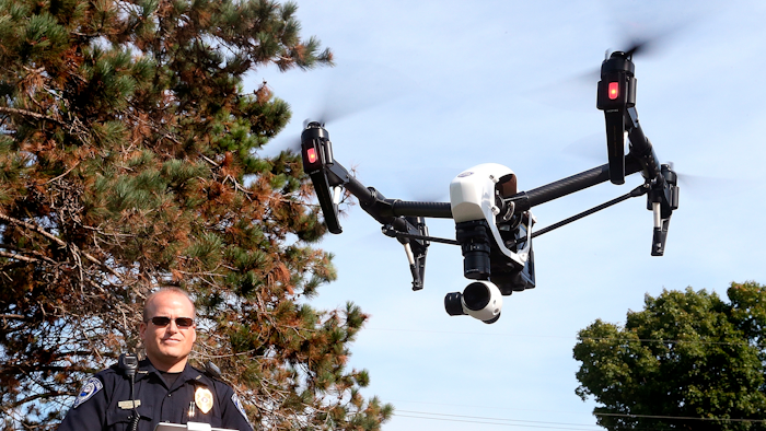 In this Sept. 16, 2015 file photo, West Salem police chief Charles Ashbeck flies his department's new drone in West Salem, Wis.
