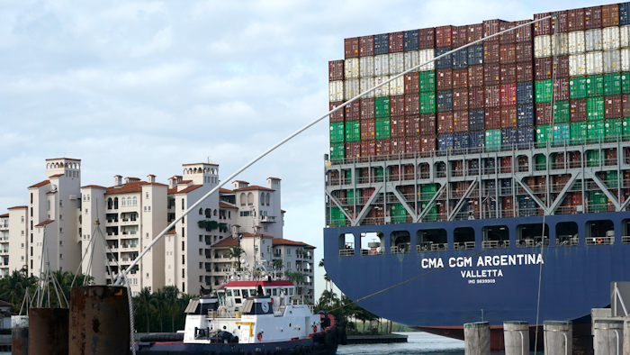 This April 6, 2021 photo shows the CMA CGM Argentina arrives at PortMiami in Miami. The U.S. economy grew at a solid 6.4% rate in the first three months of this year.