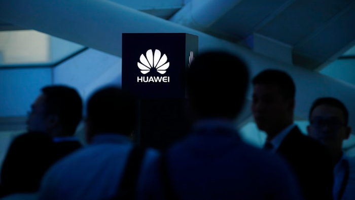 Huawei logo during a launch event for the Huawei Matebook, Beijing, May 26, 2016.