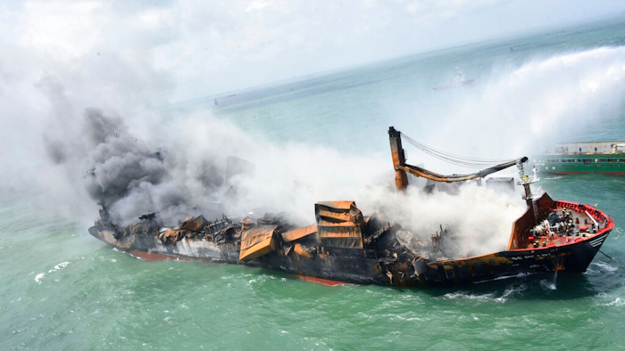 This photo provided by Sri Lankan Air Force shows the sinking MV X-Press Pearl at Kapungoda where it is anchored off Colombo port, Sri Lanka, Wednesday, June 2, 2021. Salvage experts were attempting to tow the fire-stricken container ship that had been loaded with chemicals into the deep sea as the vessel started to sink Wednesday. Water submerged the MV X-Press Pearl's quarterdeck a day after firefighters extinguished a blaze that had been burning for 12 days.