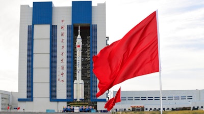 A Shenzhou-12 manned spaceship and Long March-2F carrier rocket transferred to the launching area of Jiuquan Satellite Launch Center, June 9, 2021.