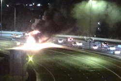 Image from a remote traffic camera showing the scene of a crash involving a milk tanker truck in Phoenix, June 9, 2021.
