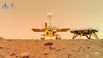 The Chinese Mars rover Zhurong seen near its landing platform from a remote camera, June 11, 2021.