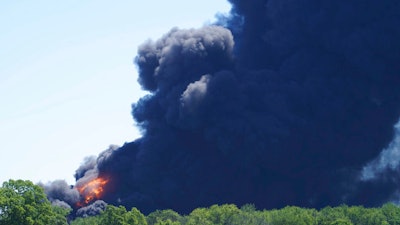 Flames and smoke are seen from an explosion at a chemical plant in Rockton, IL on Monday, June 14.