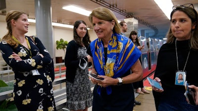 Sen. Shelley Moore Capito, R-W.Va., walks on Capitol Hill in Washington, Tuesday, June 8, 2021.