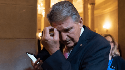 Sen. Joe Manchin, D-W.Va., arrives for a meeting at the Capitol in Washington, Wednesday, June 23, 2021.