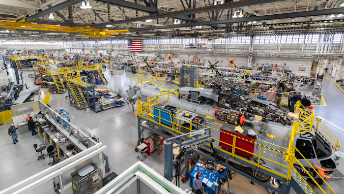 Sikorsky employees building CH-53K aircraft utilizing 3-D work instructions, new titanium machining centers with multi-floor ergonomic platforms in Stratford, Conn.