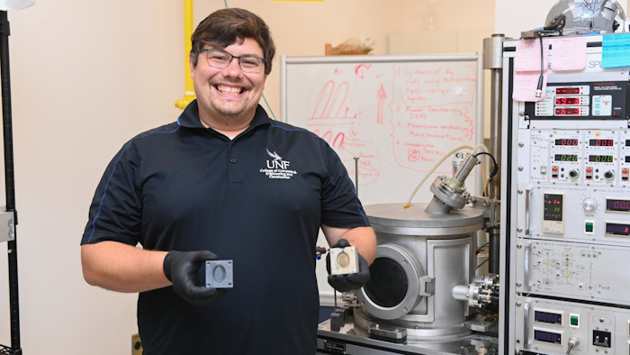 Dr. Steve Stagon holds molds in UNF's 3D Printing Lab.