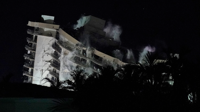 The remaining structure of the Champlain Towers South condo building is demolished more than a week after it partially collapsed, late Sunday, July 4, 2021, in Surfside, Fla.