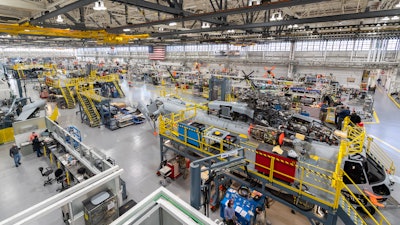 Sikorsky employees building CH-53K aircraft utilizing 3-D work instructions, new titanium machining centers with multi-floor ergonomic platforms in Stratford, Conn.