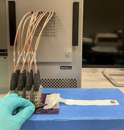 Ultrasound patch wired to its full experimental setup.