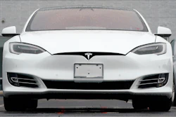 This Sunday, May 9, 2021 file photo shows vehicles at a Tesla location in Littleton, Colo. Tesla delivered 201,250 vehicles in the second quarter, an improvement over first-quarter figures but below the expectations of Wall Street analysts. Tesla and other automakers have been hampered by a global shortage of computer chips.