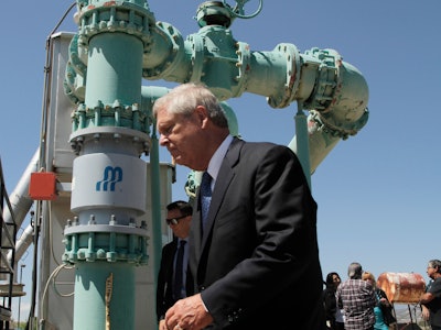 Agriculture Secretary Tom Vilsack tours a tribal wastewater facility on Wednesday, July 7, 2021, in Ohkay Owingeh, New Mexico. Vilsack announced that the Pueblo will receive a $610,000 loan and a $1.6 million grant in state money to expand the wastewater treatment plant where.