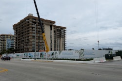 All that remains of the Champlain building are the walls of the underground parking garage, around a hollowed-out foundation.