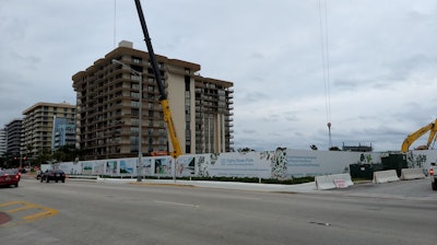 All that remains of the Champlain building are the walls of the underground parking garage, around a hollowed-out foundation.