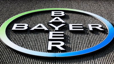 This Monday, May 23, 2016, file photo, shows the Bayer AG corporate logo displayed on a building of the German drug and chemicals company in Berlin. Bayer, which bought Monsanto in 2018, said the company disagreed with the verdict and may appeal.