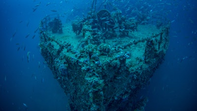 The bow of the wrecked steamship Vis with shoal of fish. The wreck lies in the Croatian Adriatic sea. The ship was sunk after hitting a mine just after the end of WW2.