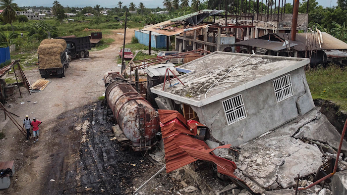 Machinery sits at the Etheuss vetiver oil factory after it was made inoperable by the 7.2 magnitude earthquake in Les Cayes, Haiti, Thursday, Aug. 19, 2021. Many of the factories that contributed to the multimillion-dollar industry responsible for more than half the world's vetiver oil used in fine perfumes, cosmetics, soaps and aromatherapy, are now inoperable.