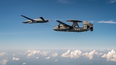 Boeing’s MQ-25 T1 test asset refuels a U.S. Navy E-2D command and control aircraft Aug. 18 during a flight test mission conducted from MidAmerica St. Louis Airport.