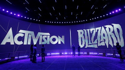 This June 13, 2013 file photo shows the Activision Blizzard Booth during the Electronic Entertainment Expo in Los Angeles.