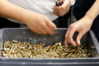 In this July 16, 2019, file photo, officers taking part in training load gun clips with ammunition at the Washington State Criminal Justice Training Commission in Burien, Wash. The COVID-19 pandemic coupled with record sales of firearms have created a shortage of ammunition in the United States that has impacting competition and recreational shooters, hunters, people seeking personal protection and law enforcement agencies.