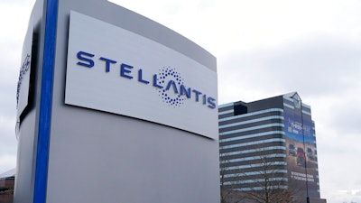In this file photo taken on Jan. 19, 2021, the Stellantis sign is seen outside the Chrysler Technology Center, Tuesday, in Auburn Hills, Mich. Stellantis reported net profit of 5.9 billion euros ($7 billion) in the first half of 2021.