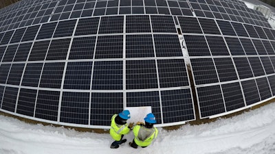 Energy storage can make facilities like this solar farm in Oxford, Maine, more profitable by letting them store power for cloudy days.