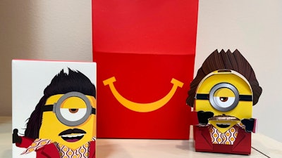 A cardboard McDonald’s Happy Meal toy is shown with a Happy Meal box, Sept. 20, 2021.