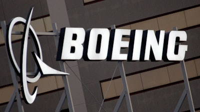 In this Jan. 25, 2011, file photo, is the Boeing Company logo on the property in El Segundo, Calif. Chicago-based aerospace giant Boeing Co. will invest $200 million to manufacture the U.S. Navy’s latest unmanned aircraft at MidAmerica St. Louis Airport.