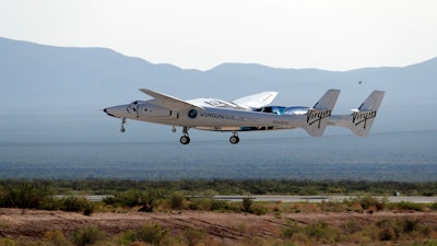 In this Sunday, July 11, 2021 file photo, the craft carrying Virgin Galactic founder Richard Branson and other crew members takes off from Spaceport America near Truth or Consequences, N.M. Virgin Galactic plans to launch three Italian researchers to the edge of space in a few weeks, even as its previous flight with founder Richard Branson is under investigation by the Federal Aviation Administration.