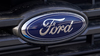 This April 25, 2021 photo shows the blue oval logo of Ford Motor Company in east Denver. Ford say, Thursday, Sept. 9, it’s going to stop making vehicles for sale in India immediately as part of its efforts to return its business there to profitability, resulting in the loss of approximately 4,000 jobs.