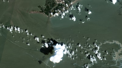 In a satellite image provided by Maxar Technologies, an oil slick is shown on Sept. 2, 2021 south of Port Fourchon, La. The U.S. Coast Guard said Saturday, Sept. 4, that cleanup crews are responding to a sizable oil spill in the Gulf of Mexico following Hurricane Ida.