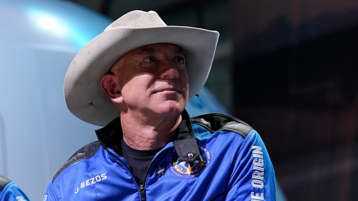 In this July 20, 2021 file photo, Jeff Bezos, founder of Amazon and space tourism company Blue Origin, participates in post launch briefing from its spaceport near Van Horn, Texas. A group of more than 20 current and former employees are accusing Jeff Bezos’ Blue Origin of being a toxic work environment and not following proper safety protocols.