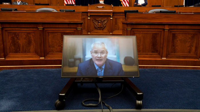 Darren Woods, CEO of ExxonMobil testifies via video conference during a House Committee on Oversight and Reform hearing on the role of fossil fuel companies in climate change, Thursday, Oct. 28, 2021, on Capitol Hill in Washington.