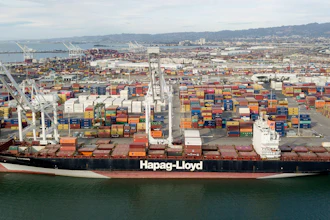 The Rotterdam Express is seen at the Port of Oakland, Wednesday, Oct. 6, 2021 in Oakland, Calif. The Rotterdam Express, a massive cargo ship made a series of unusual movements while anchored in the closest spot to a Southern California oil pipeline that ruptured and sent crude washing up on beaches, according to data collected by a marine navigation service.