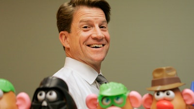 Brian Goldner of Hasbro stands next to some of the company's toy figures at its headquarters, Pawtucket, R.I., May 20, 2008.