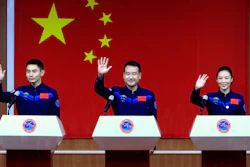 Chinese astronauts, from left, Ye Guangfu, Zhai Zhigang and Wang Yaping at the Jiuquan Satellite Launch Center, Oct. 14, 2021.