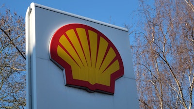 In this Wednesday, Jan. 20, 2016 file photo, the Shell logo is at a petrol station in London. Oil giant Royal Dutch Shell has warned that it will take an earnings hit of up to $500 million as a result of the disruptions caused by Hurricane Ida.