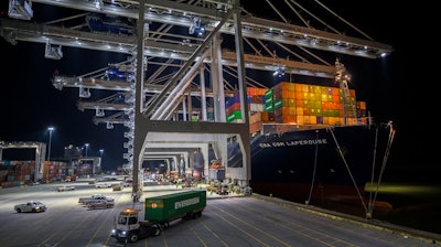 Five ship to shore cranes and gangs of longshoremen work to load and unload the container ship CMA CGM Laperouse at the Georgia Ports Authority's Port of Savannah, Wednesday, Sept. 29, 2021, in Savannah, Ga. With three months until Christmas, toy companies are racing to get their toys onto store shelves as they face a severe supply network crunch.